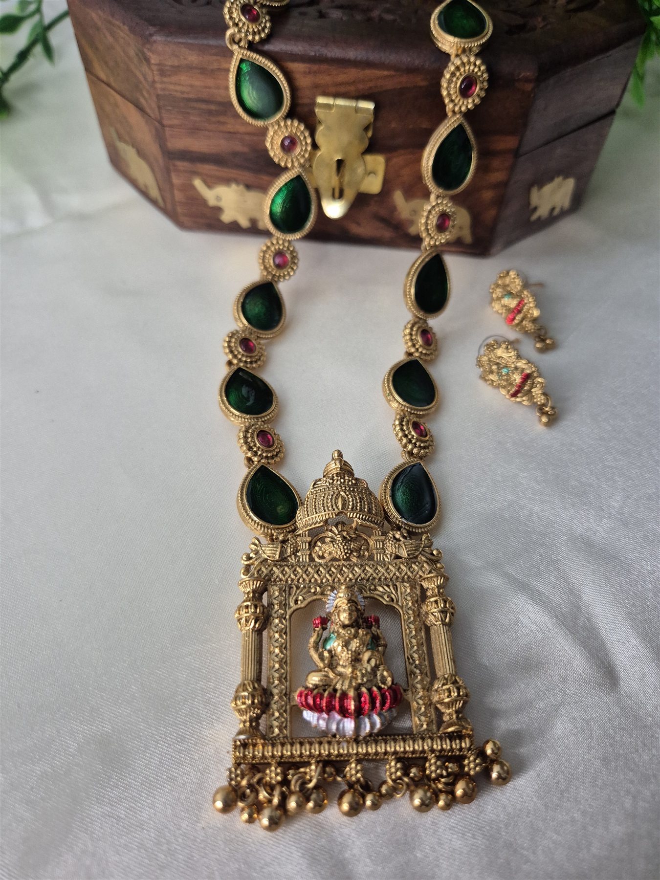 Green-stone temple necklace with matching earrings